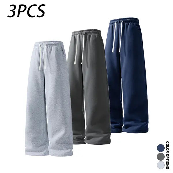 Men’s casual minimalist comfortable long pants for spring and autumn, featuring an elastic waistband with tie closure, a loose fit suitable for sports and fitness, versatile everyday casual long pants.