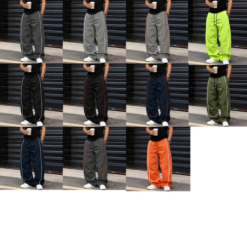 Men’s summer black-and-red quick-dry wide-leg pants with side stripes and a drawstring waist; breathable fabric with a slight wrinkle texture, loose straight cut, side stripe detailing, adjustable cuffs at the leg openings. Suitable for jogging, fitness,